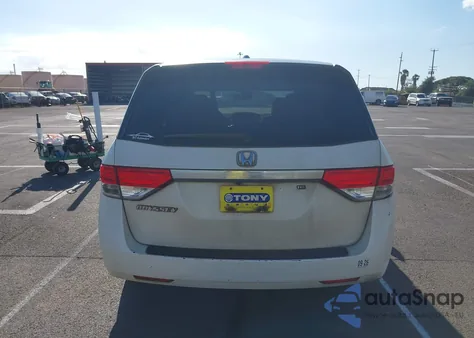 2014 Honda Odyssey Ex-L z USA, uszkodzony, nr VIN 5FNRL5H67EB083570